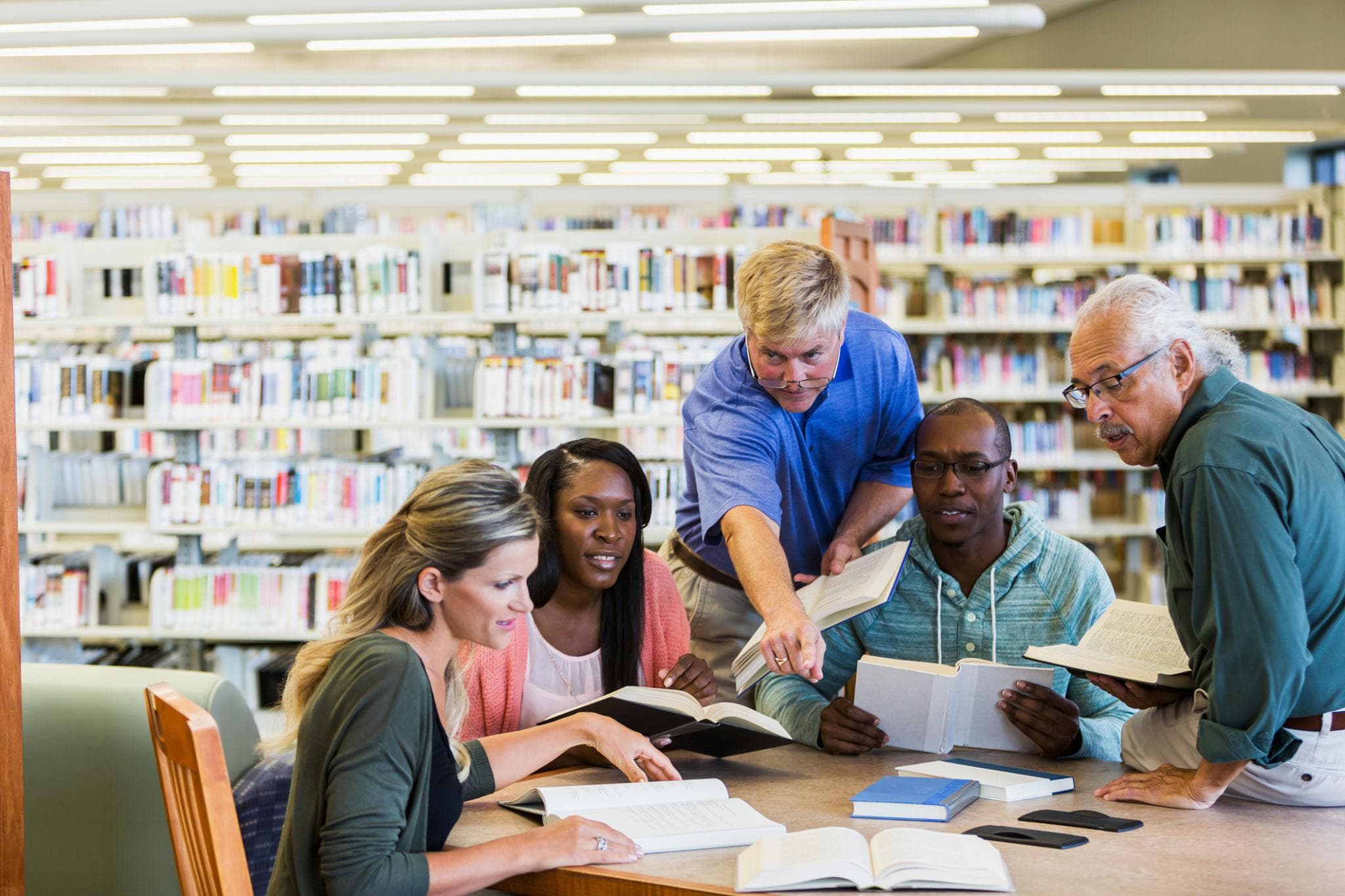Books and shared learning in a sunlit library